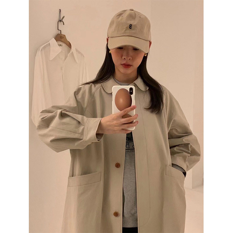 2026韩国东大门鸡蛋家简约减龄娃娃领灯笼袖大口袋中长款风衣外套