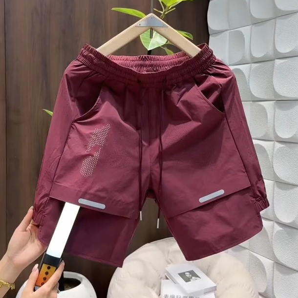 夏季潮牌激光打孔拼接速干短裤男