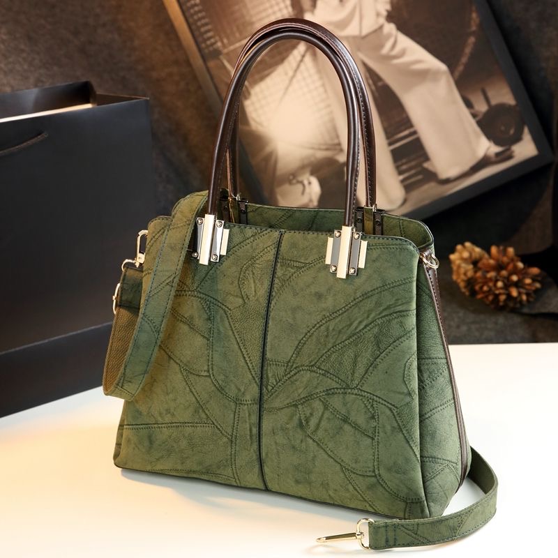 女包水桶包秋冬拼色女包2025新款包包挂件高级感斜挎包