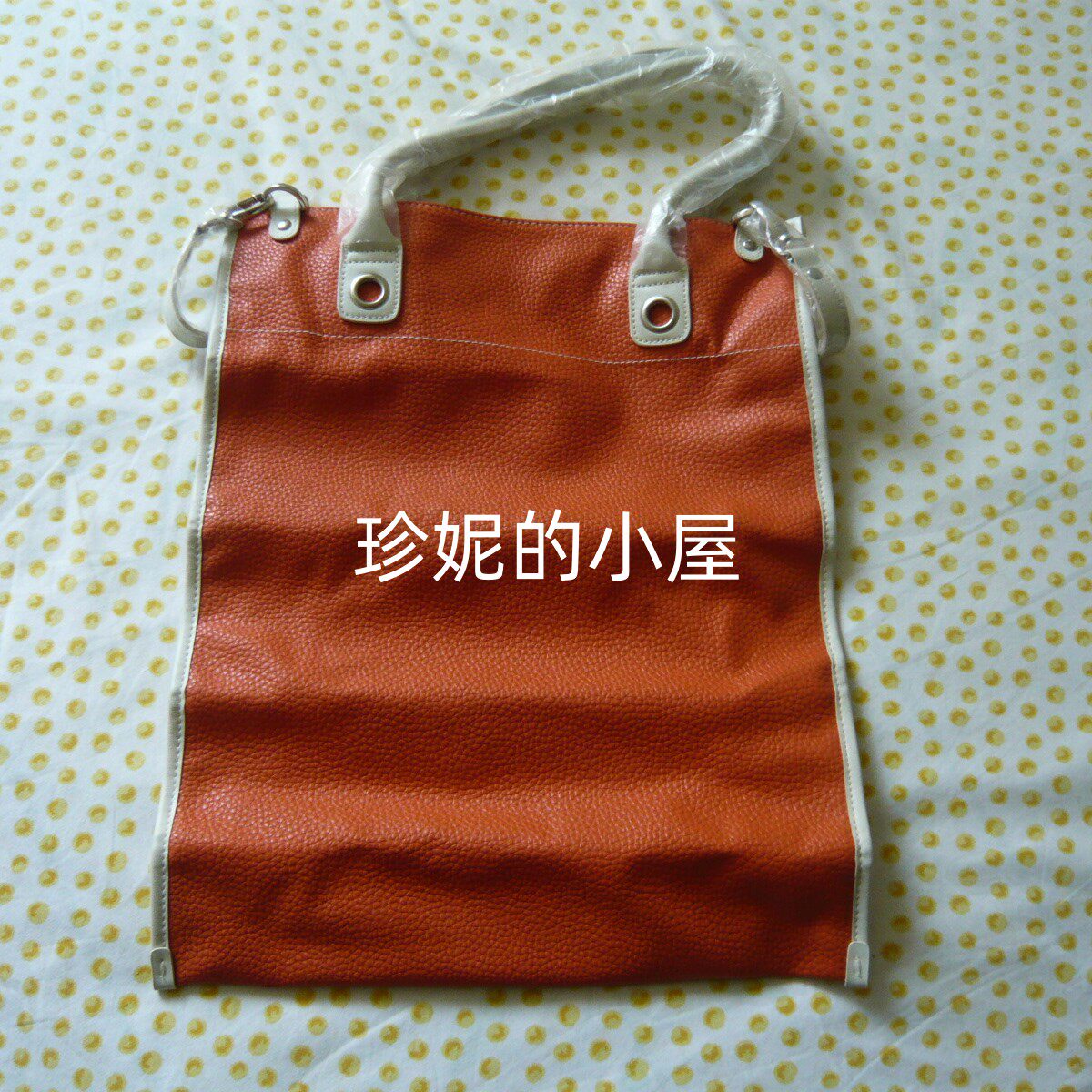 倩碧橘色水桶手拎包