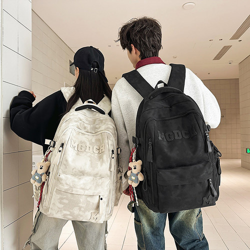 减负护脊初中生书包男学生轻便大容量背包2025新款高中女孩双肩包