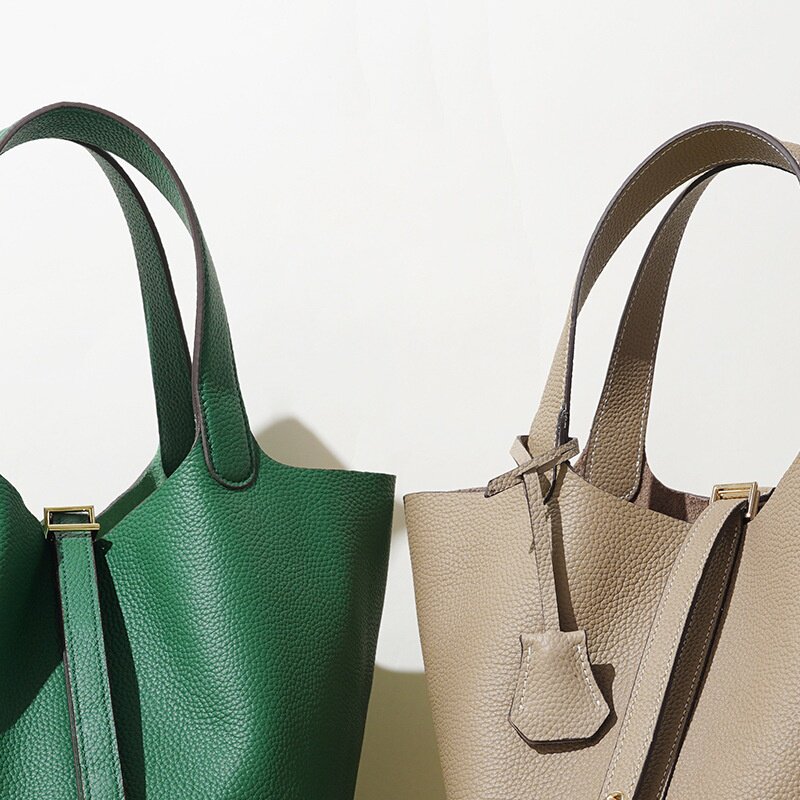 2025秋冬简约女包感真皮包通勤菜篮子水桶百搭2025黑色真皮