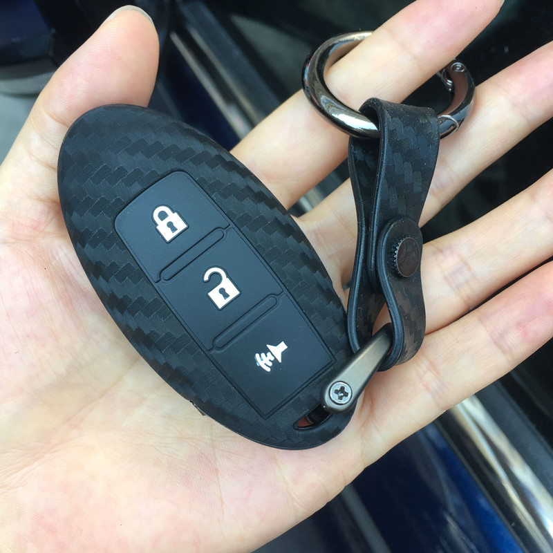 适用尼桑日产天籁奇骏轩逸逍客骊威英菲尼迪碳纤纹硅胶车用钥匙包