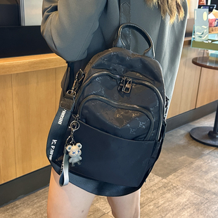 高颜值印花牛津布双肩包女2025新款时尚百搭休闲防水轻便旅游背包