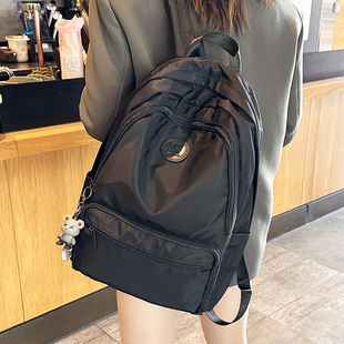 大容量休闲旅游登山包双肩包女2025新轻便防水通勤电脑包牛津背包