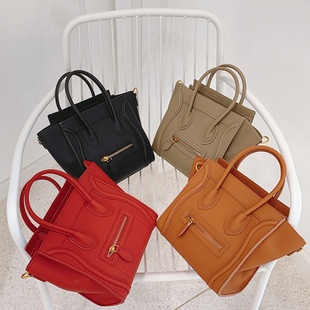 高级感女士囧字包包2024新款 蝙蝠翅膀斜挎包女百搭ins手提笑脸包