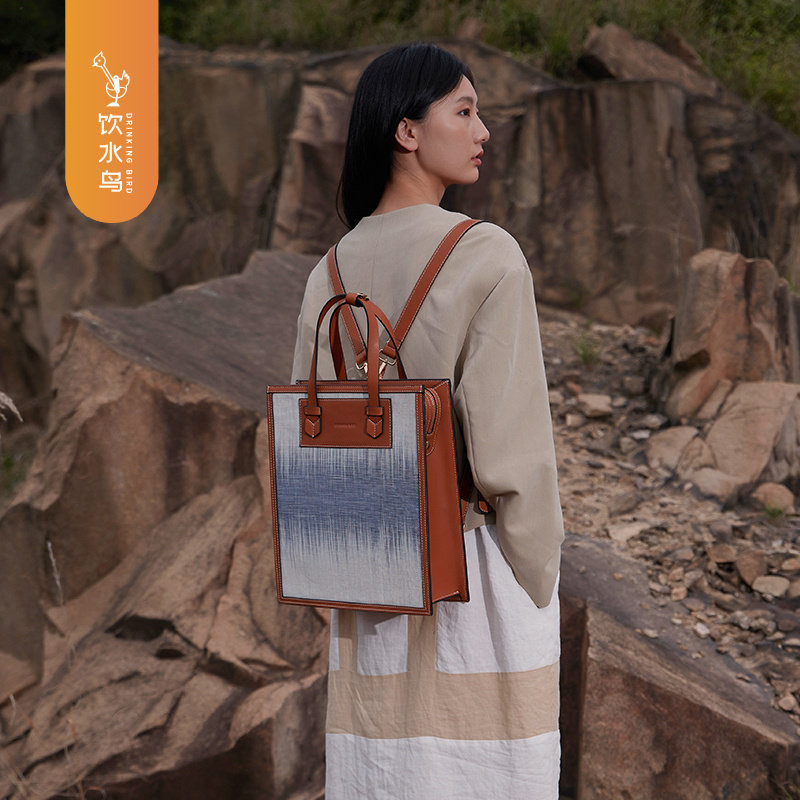 饮水鸟非遗夏布牛皮托特双肩电脑包大容量竖款撞色民族风潮流中性,箱包皮具/热销女包/男包,托特包,淘宝优惠券,粉丝福利购,淘宝优惠卷