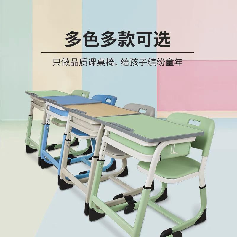 厂家直销学校学生课桌椅法式抽芯弯可升降中空椅板单人双人课桌椅