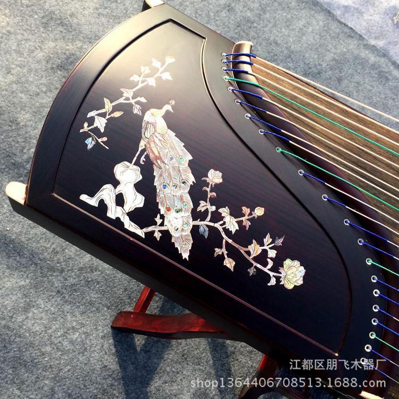 紫檀鹏飞古筝厂家直销鹏飞古筝扬州挖嵌孔雀款专业演奏古筝