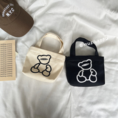 新款 帆布化妆包女学生小手拎包大容量手机水乳刷零食收纳包袋 韩版