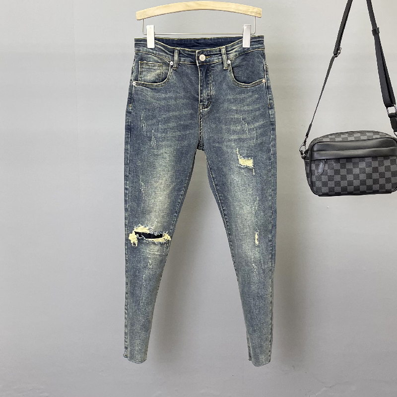 毛边裤脚水洗复古蓝补丁破洞牛仔裤男士弹力修身小脚裤九分裤潮流