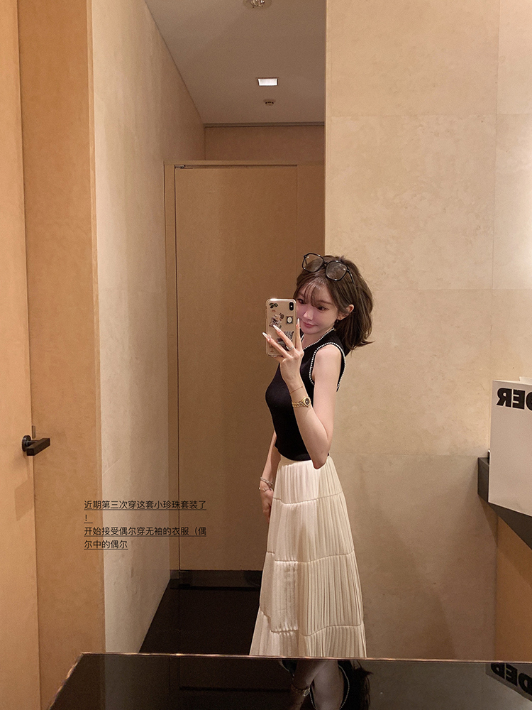 金蘑菇菇 代官山假日 effortless极简/黑白无袖上衣百褶半裙套装