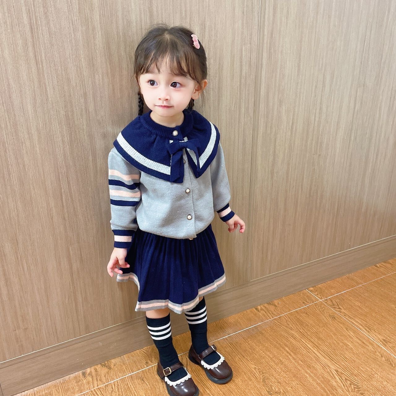 女童长袖套装2024春款新品学院风蝴蝶结针织开衫毛衣搭短裙两件套