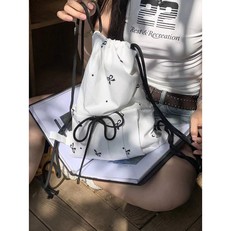 ins风韩版白色包包甜美蝴蝶结印花抽带式束口双肩背包女轻便
