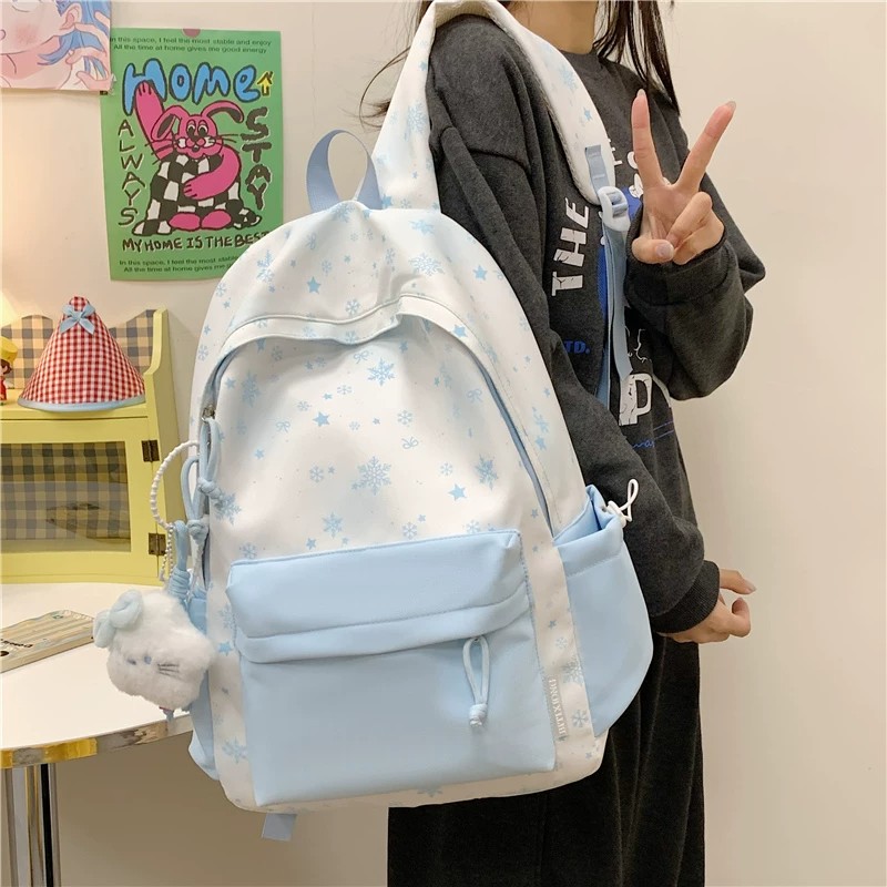 蓝色书包初中生女高中生高颜值轻便背包小学生女大容量旅行双肩包