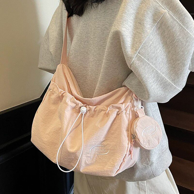 小众轻便斜挎包包女2026新款大容量帆布包韩版褶皱上课单肩托特包