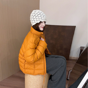 话里纯色气质排骨羽绒服2025冬季新款韩版百搭加厚时尚上衣外套女