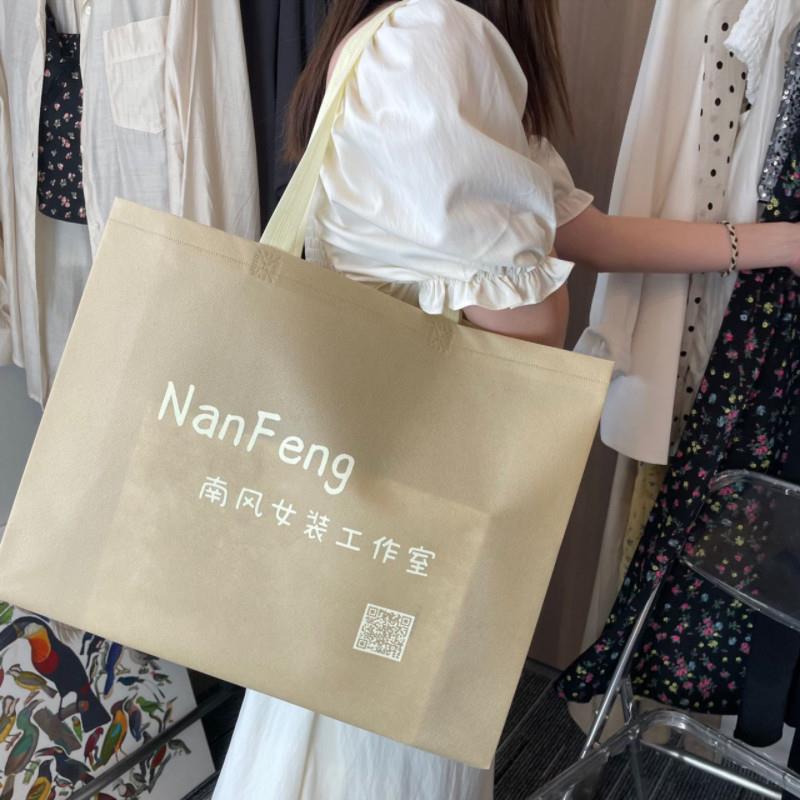无纺布袋定制印刷logo服装店手提袋子订制环保购物手提袋加厚定做