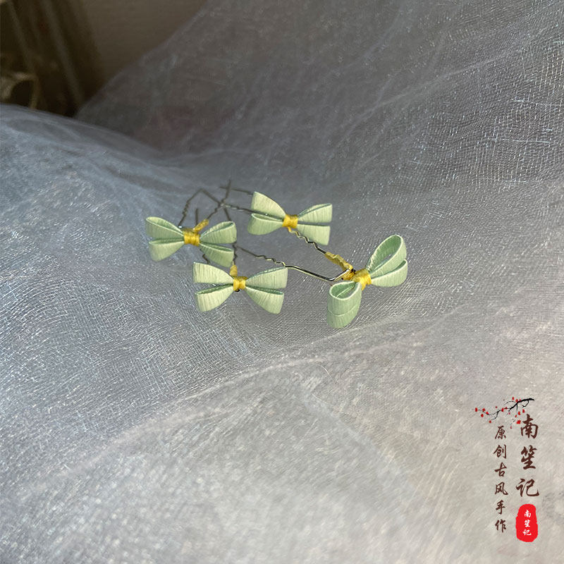 19.9四只包邮缠花小蝴蝶结