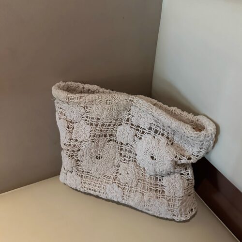 镂空编织花朵纯色布艺化妆包