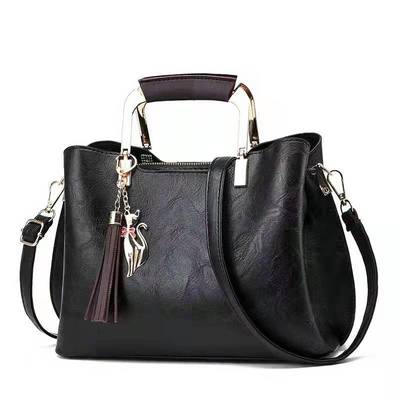 香港真皮包包2025新款时尚简约单肩斜挎包百搭大气复古手提包女包