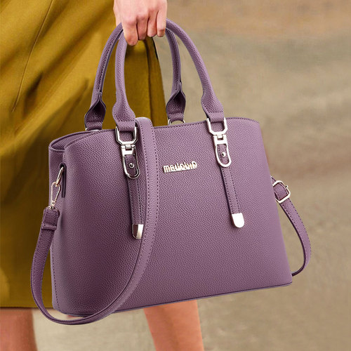 香港真皮女士包包时尚手提包