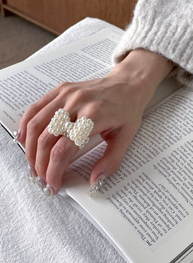 韩国东大门edito珍珠蝴蝶结甜美百搭弹力绳戒指