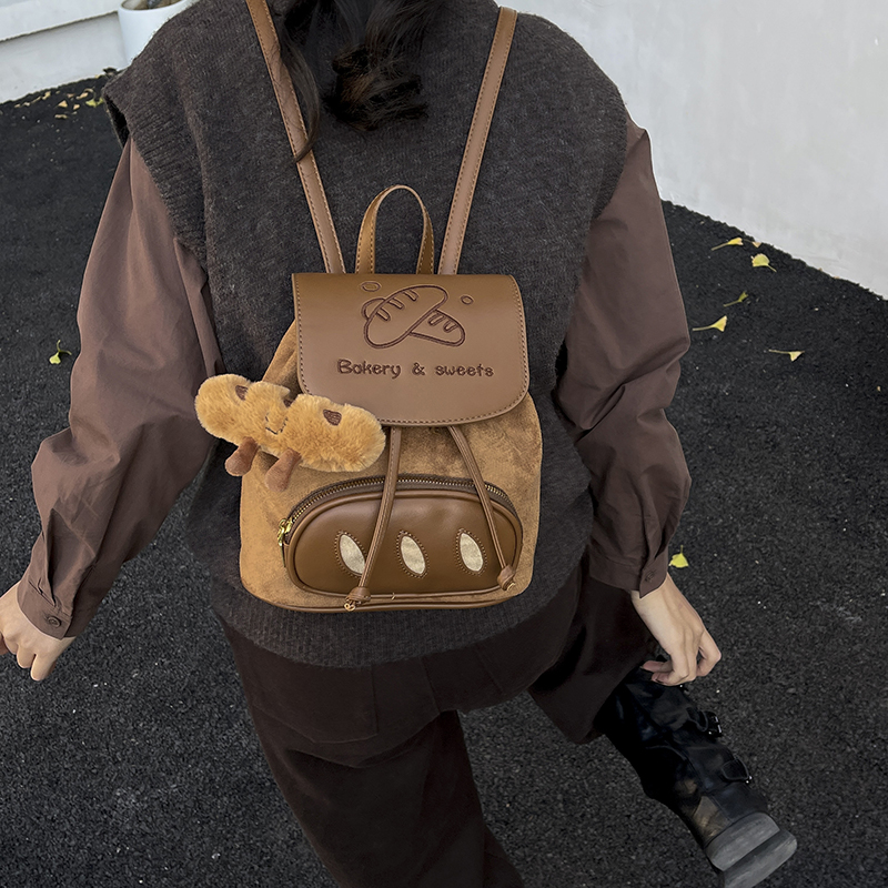 可爱面包双肩包女2025新款日常通勤百搭迷你书包学生党可爱小背包