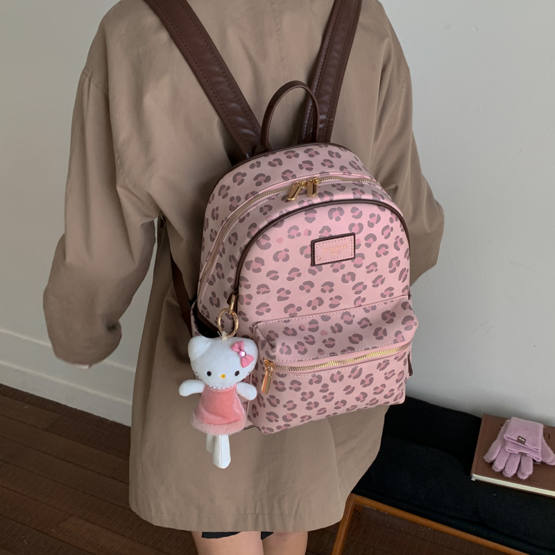 粉色豹纹双肩包大学生通勤2025新款秋冬设计感大容量韩系小书包女