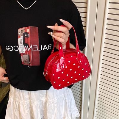 红色手提包小拎包女小众设计2025新款可爱韩系斜挎包波点保龄球包