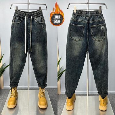 2025冬季加绒加厚保暖牛仔裤男宽松小脚哈伦裤潮流简约弹力休闲裤