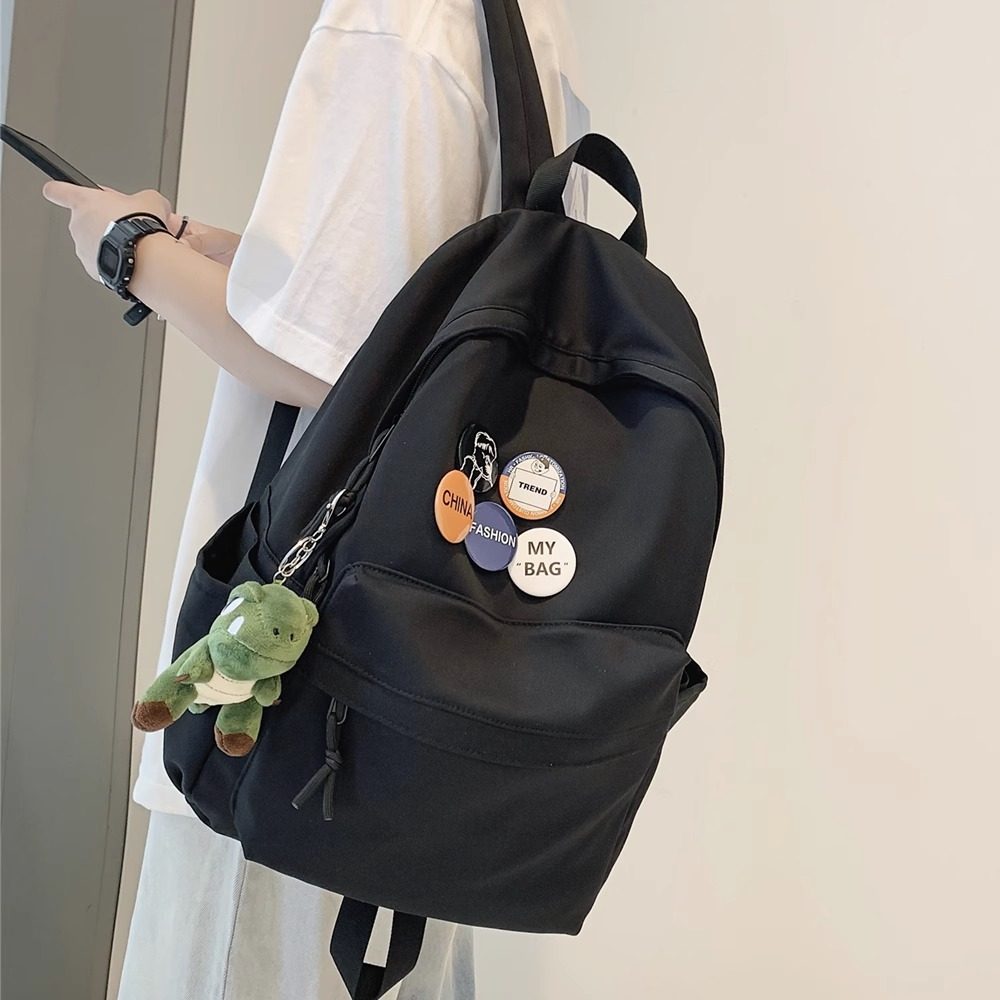 简约纯色大学生书包男生女生2026新款旅行包大容量双肩包电脑背包