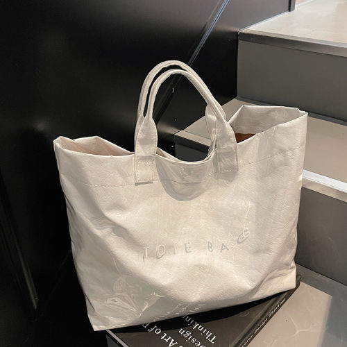 大容量牛皮纸果冻包2025新款透明防水手提袋上班通勤斜挎托特包包