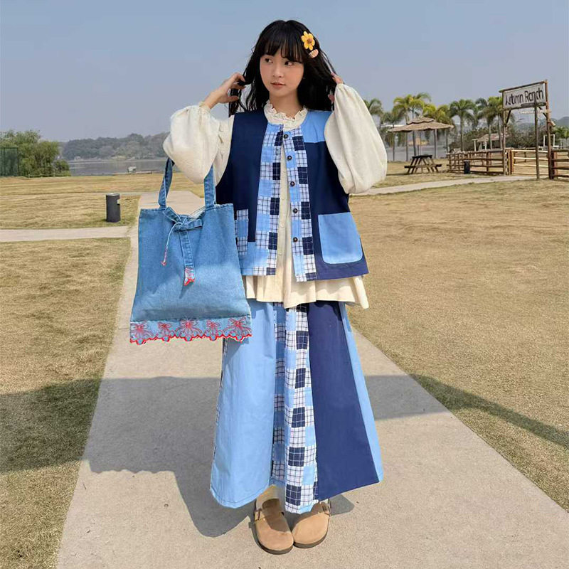 2026春上新文艺复古格子半身裙少女甜美宽松撞色拼接中长款女裙