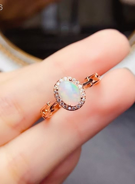 天然欧泊戒指晶体全净火彩爆闪，S925银精工镶嵌主石5*7mm。