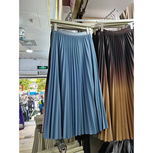 白色a字半身裙女冬季2025新款显瘦垂坠感气质半身长款休闲百褶裙