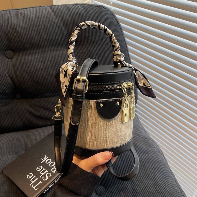 韩系超火流行小众设计圆筒包2025新款时尚简约单肩手提斜挎水桶包,箱包皮具/热销女包/男包,水桶包,淘宝优惠券,粉丝福利购,淘宝优惠卷