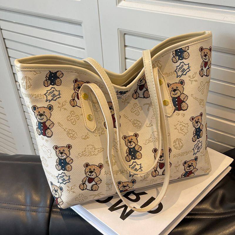 大包包女2025夏季新款韩版大容量单肩包小熊印花外出托特包通勤包,箱包皮具/热销女包/男包,托特包,淘宝优惠券,粉丝福利购,淘宝优惠卷