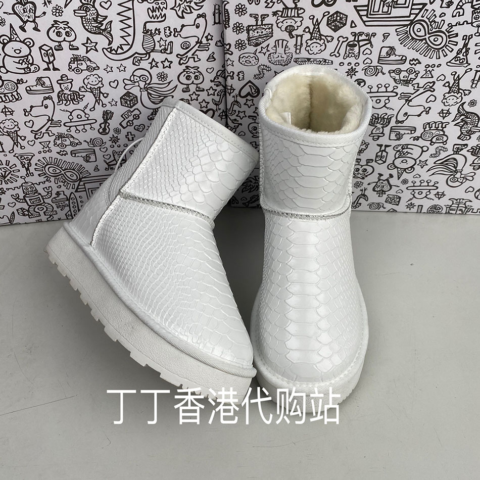 2025新款白色蛇纹隐形内增高雪地靴真皮防水防滑厚底短筒加绒女靴