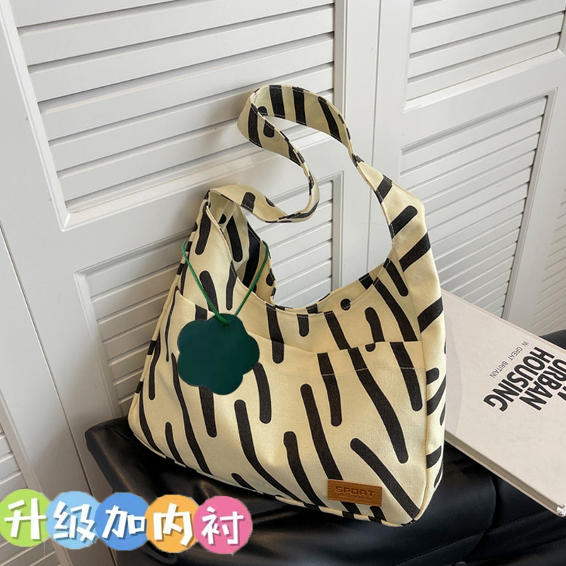 有内衬加厚斑马纹帆布包