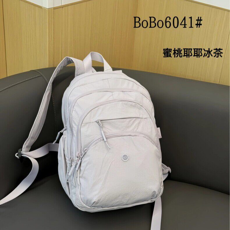 博卜三代泡芙多隔层防盗双肩电脑包男女中号轻便防泼水可套拉杆箱