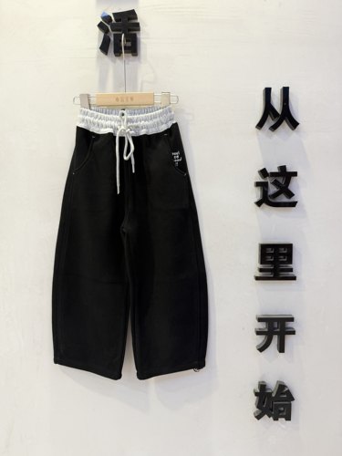 儿童洋气弯刀裤2026秋款中招童韩版宽松百搭纯色撞腰黑色休闲卫裤