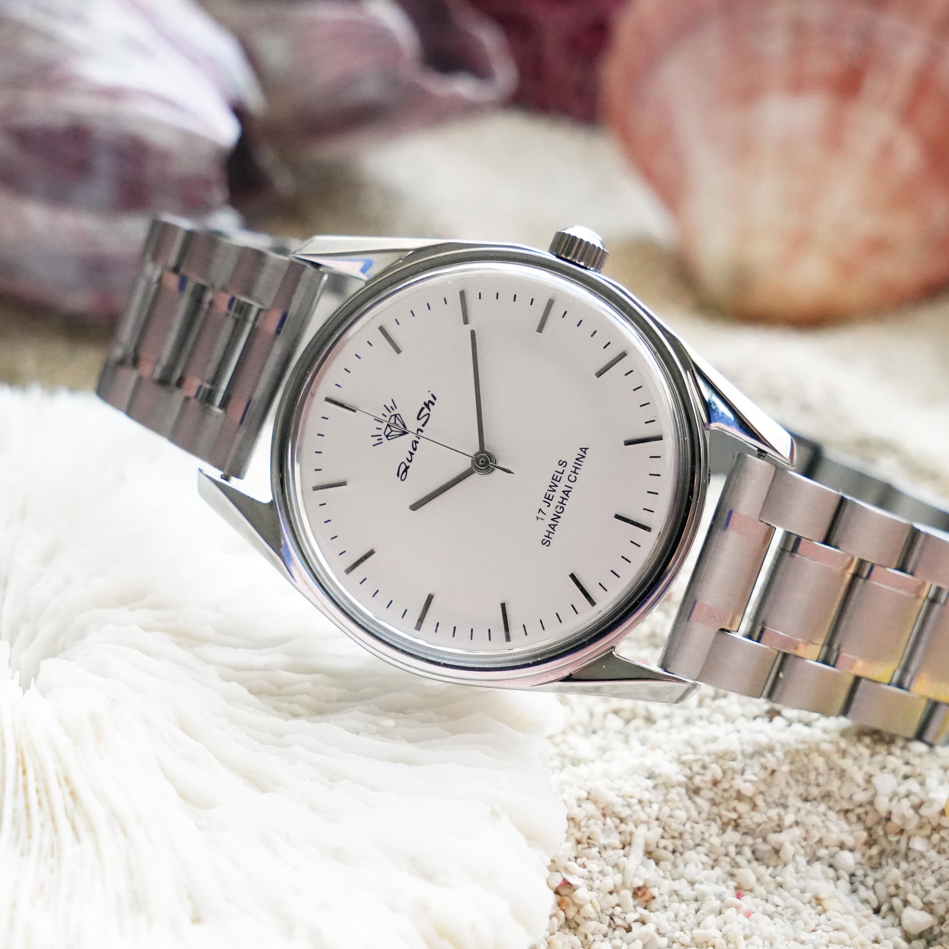 国产库存老表上海钻石牌手动机械表上发条抗震实心钢表带17钻正品