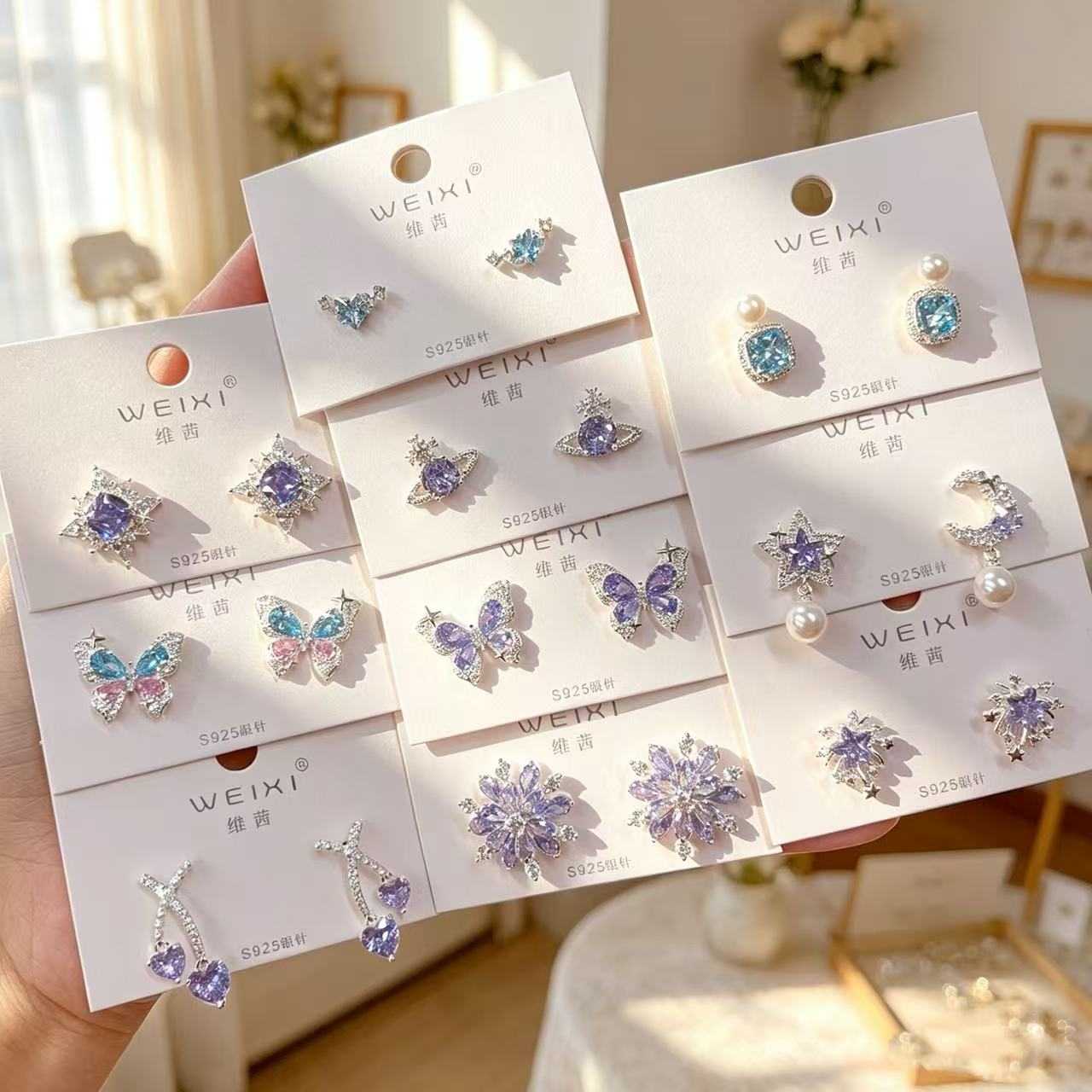 维茜 紫色星球耳钉小众设计甜美气质少女粉蓝蝴蝶925银针耳饰图片