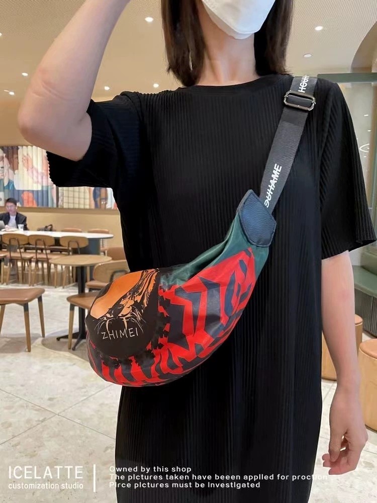 流行包包女2025新款时尚帆布饺子包月牙包腰包女士休闲运动斜挎包