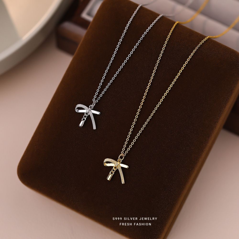 S999纯银简约线条蝴蝶结项链女流苏小众设计时尚简约百搭锁骨链