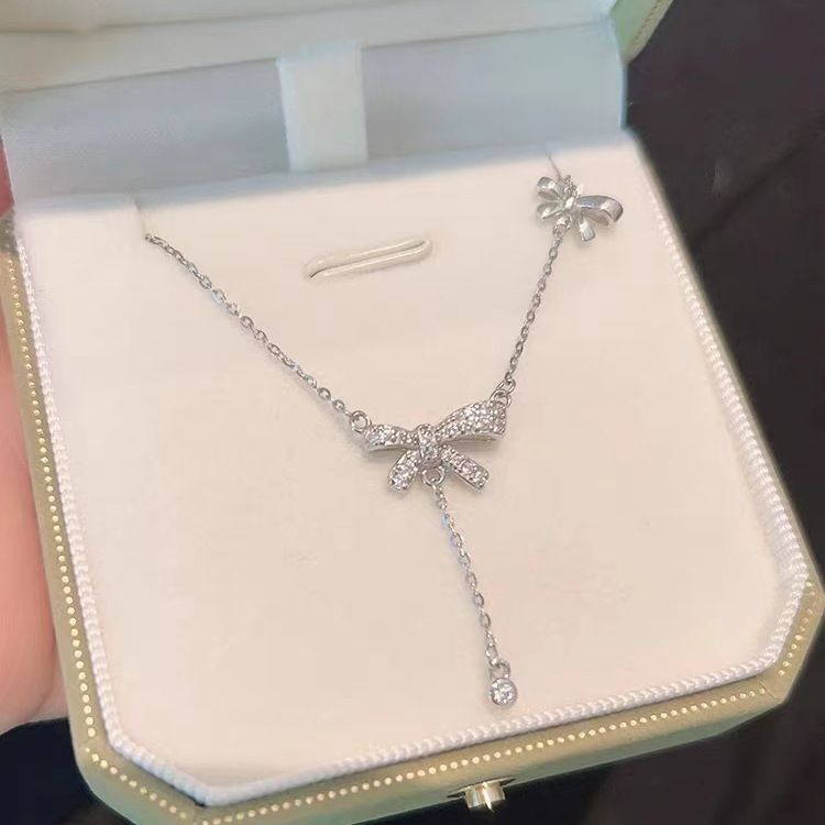 S925纯银蝴蝶结锆石流苏项链女轻奢小众锁骨链高级感吊坠饰品礼物