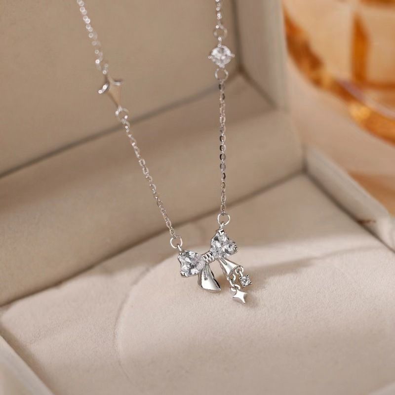 s925纯银蝴蝶结项链女轻奢感锆石四芒星吊坠小众时尚锁骨链