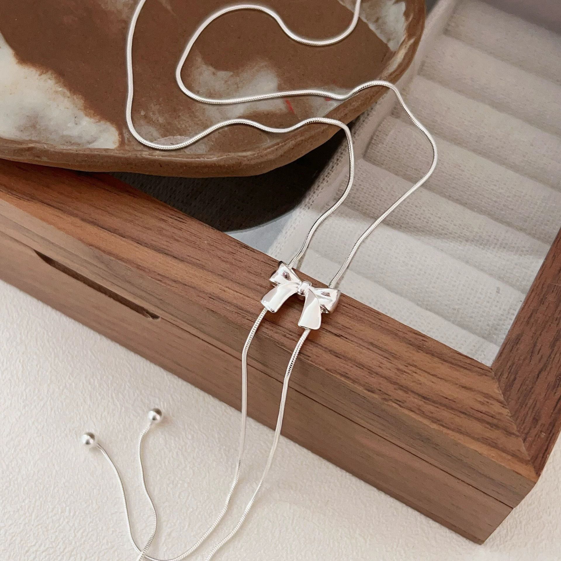 S999纯银蝴蝶结抽拉项链女日韩简约时尚毛衣链高级感小红书爆款