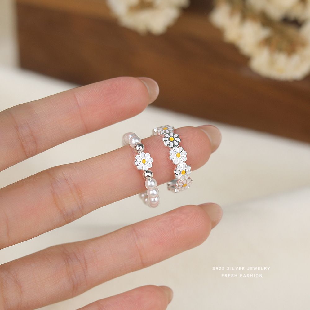 s925纯银雏菊物语戒指女简约森系百搭指环设计感白色滴胶花朵手链